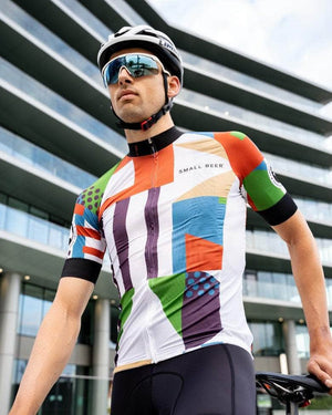 
            
                Load image into Gallery viewer, Male cyclist wearing the Small Beer x Paria cycling jersey for men
            
        